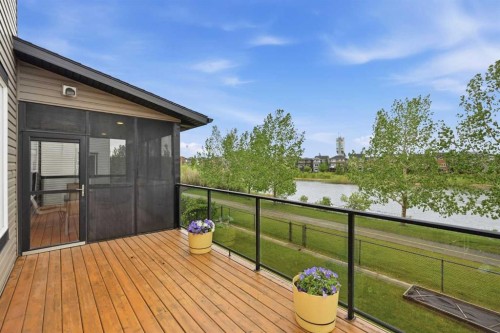 114 Cougarstone Crescent Sw, Calgary, AB - Outdoor With Body Of Water With Deck Patio Veranda With Exterior
