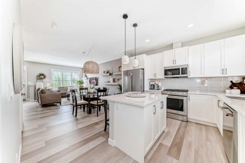 116 Precedence Way, Cochrane, AB - Indoor Photo Showing Kitchen With Upgraded Kitchen