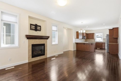 26 Violet Close, Olds, AB - Indoor Photo Showing Living Room With Fireplace