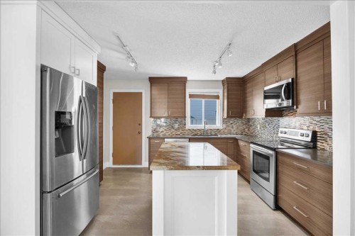 16207 Shawfield Drive Sw, Calgary, AB - Indoor Photo Showing Kitchen With Upgraded Kitchen