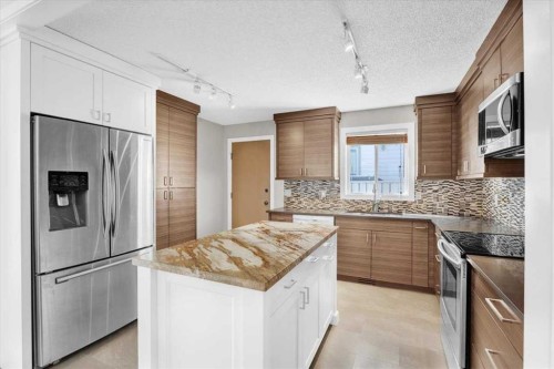 16207 Shawfield Drive Sw, Calgary, AB - Indoor Photo Showing Kitchen With Upgraded Kitchen