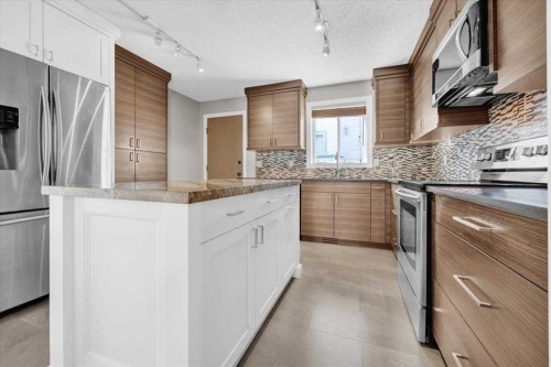 16207 Shawfield Drive Sw, Calgary, AB - Indoor Photo Showing Kitchen With Upgraded Kitchen