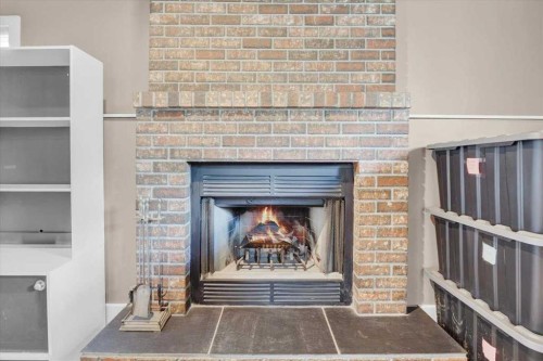 16207 Shawfield Drive Sw, Calgary, AB - Indoor With Fireplace