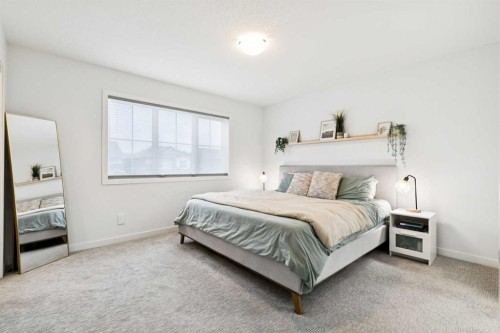 44 Creekside Boulevard Sw, Calgary, AB - Indoor Photo Showing Bedroom
