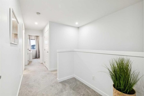 44 Creekside Boulevard Sw, Calgary, AB - Indoor Photo Showing Other Room