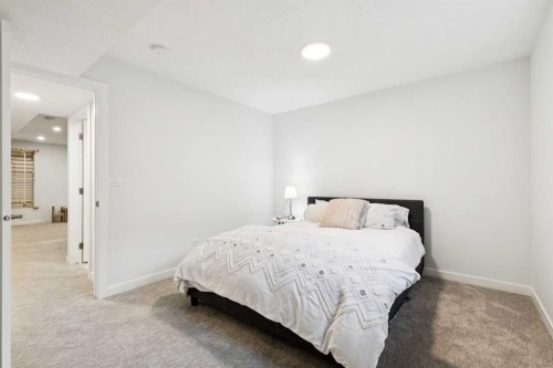 44 Creekside Boulevard Sw, Calgary, AB - Indoor Photo Showing Bedroom