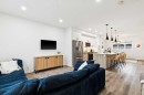 44 Creekside Boulevard Sw, Calgary, AB  - Indoor Photo Showing Living Room 