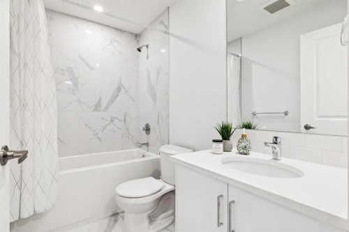 44 Creekside Boulevard Sw, Calgary, AB - Indoor Photo Showing Bathroom