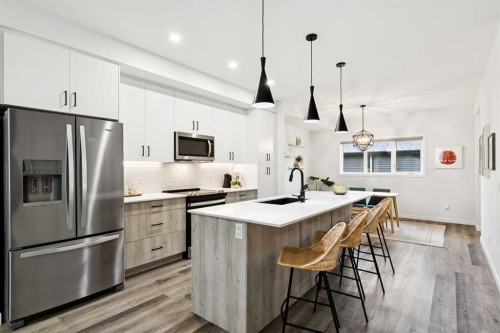 44 Creekside Boulevard Sw, Calgary, AB - Indoor Photo Showing Kitchen With Stainless Steel Kitchen With Upgraded Kitchen