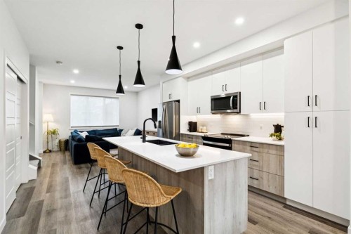 44 Creekside Boulevard Sw, Calgary, AB - Indoor Photo Showing Kitchen With Stainless Steel Kitchen With Upgraded Kitchen