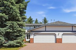22A Woodmeadow Close SW Calgary, AB T2W 4L8