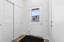 50 Creekside Way Sw, Calgary, AB  - Indoor Photo Showing Other Room 