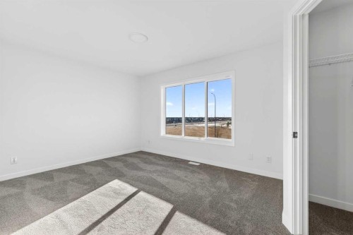 609-132 Red Embers Link Ne, Calgary, AB - Indoor Photo Showing Other Room