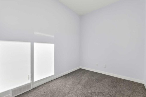 609-132 Red Embers Link Ne, Calgary, AB - Indoor Photo Showing Other Room