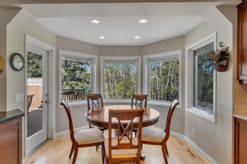 28 Woodacres Way Sw, Calgary, AB - Indoor Photo Showing Dining Room