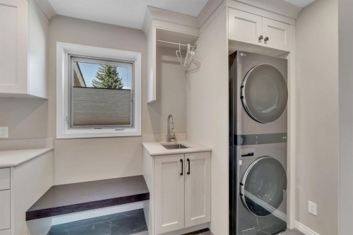 28 Woodacres Way Sw, Calgary, AB - Indoor Photo Showing Laundry Room