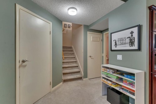 28 Woodacres Way Sw, Calgary, AB - Indoor Photo Showing Other Room