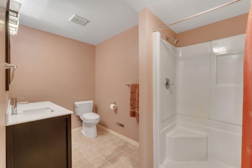 28 Woodacres Way Sw, Calgary, AB - Indoor Photo Showing Bathroom