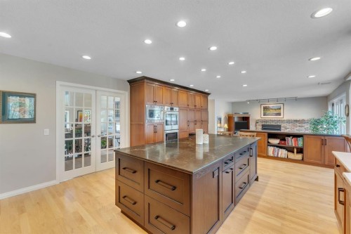 28 Woodacres Way Sw, Calgary, AB - Indoor Photo Showing Kitchen With Upgraded Kitchen