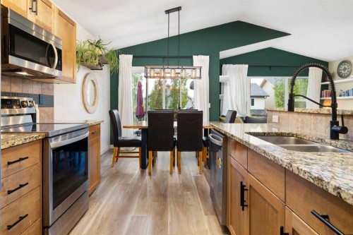 60 Sage Valley Drive Nw, Calgary, AB - Indoor Photo Showing Kitchen With Double Sink