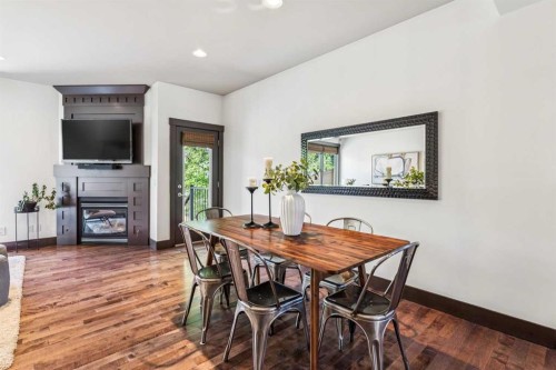 2317 16 Street Sw, Calgary, AB - Indoor Photo Showing Dining Room With Fireplace