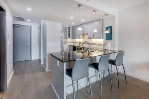 1406-888 4 Avenue Sw, Calgary, AB - Indoor Photo Showing Kitchen With Double Sink With Upgraded Kitchen