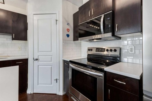 26 Auburn Bay Common Se, Calgary, AB - Indoor Photo Showing Kitchen With Upgraded Kitchen