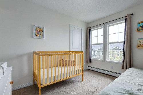 26 Auburn Bay Common Se, Calgary, AB - Indoor Photo Showing Bedroom