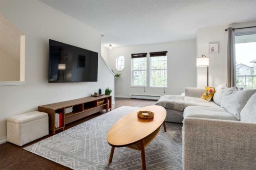 26 Auburn Bay Common Se, Calgary, AB - Indoor Photo Showing Living Room
