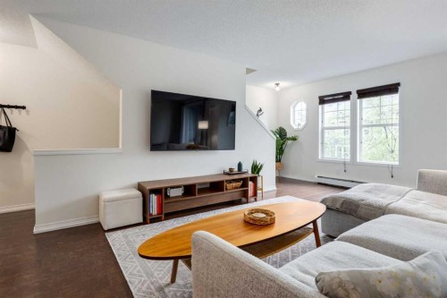 26 Auburn Bay Common Se, Calgary, AB - Indoor Photo Showing Living Room