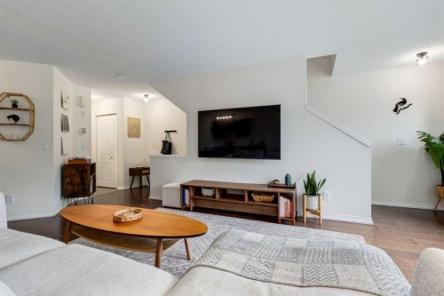 26 Auburn Bay Common Se, Calgary, AB - Indoor Photo Showing Living Room