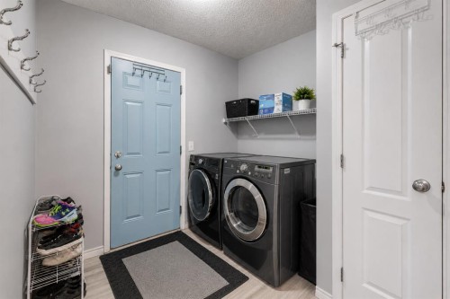 47 Westmount Road, Okotoks, AB - Indoor Photo Showing Laundry Room