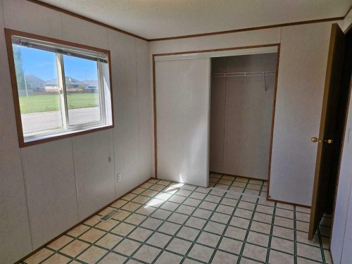64 Westover Avenue, Claresholm, AB - Indoor Photo Showing Other Room