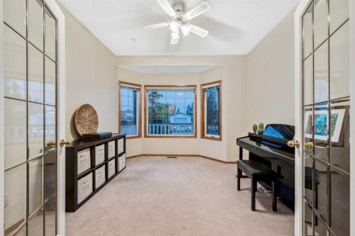 46 4 Street Ne, Langdon, AB - Indoor Photo Showing Other Room