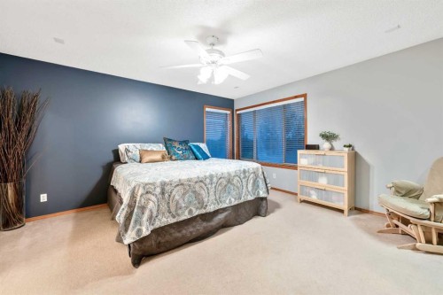 46 4 Street Ne, Langdon, AB - Indoor Photo Showing Bedroom