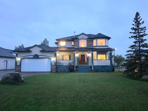 46 4 Street Ne, Langdon, AB - Outdoor With Deck Patio Veranda With Facade