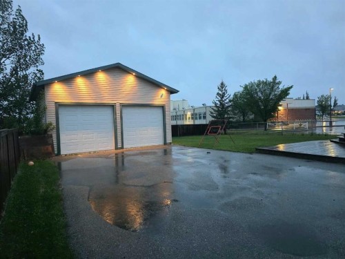 46 4 Street Ne, Langdon, AB - Outdoor