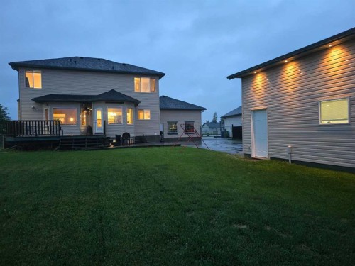 46 4 Street Ne, Langdon, AB - Outdoor With Deck Patio Veranda