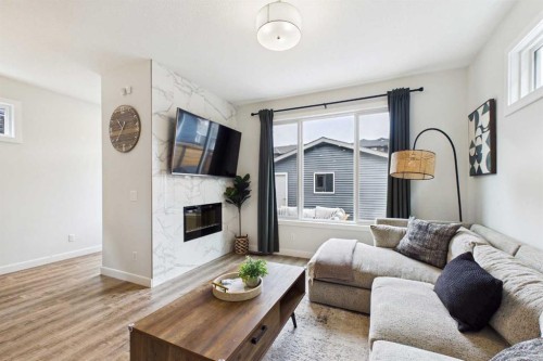 34 Birch Glen, Okotoks, AB - Indoor Photo Showing Living Room With Fireplace