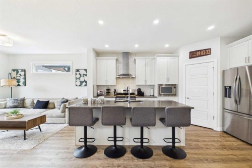 34 Birch Glen, Okotoks, AB - Indoor Photo Showing Kitchen With Upgraded Kitchen