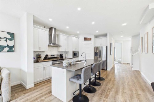 34 Birch Glen, Okotoks, AB - Indoor Photo Showing Kitchen With Upgraded Kitchen