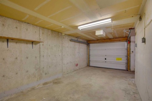 7833 Hunterquay Road Nw, Calgary, AB - Indoor Photo Showing Garage