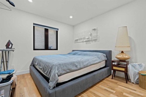 931 Shawnee Drive Sw, Calgary, AB - Indoor Photo Showing Bedroom