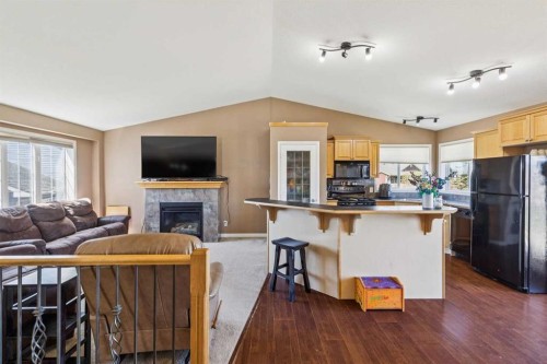 232 Hillcrest Court, Strathmore, AB - Indoor Photo Showing Kitchen With Fireplace