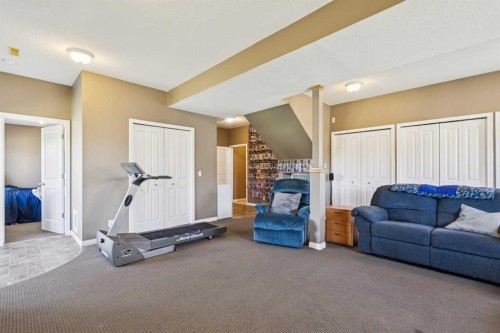232 Hillcrest Court, Strathmore, AB - Indoor Photo Showing Gym Room
