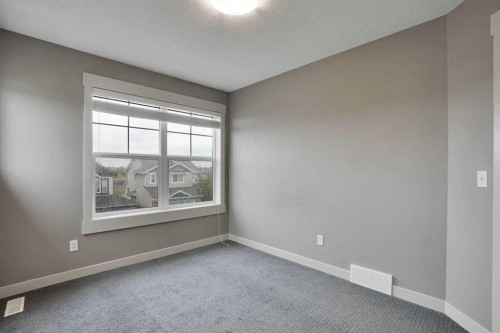 124 Lavender Link, Chestermere, AB - Indoor Photo Showing Other Room