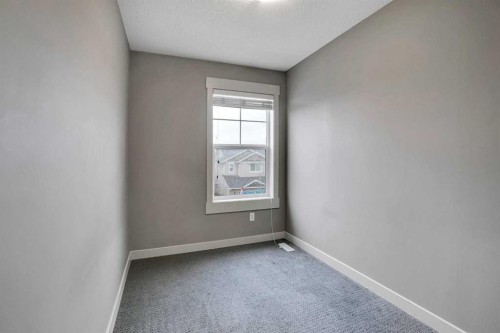 124 Lavender Link, Chestermere, AB - Indoor Photo Showing Other Room