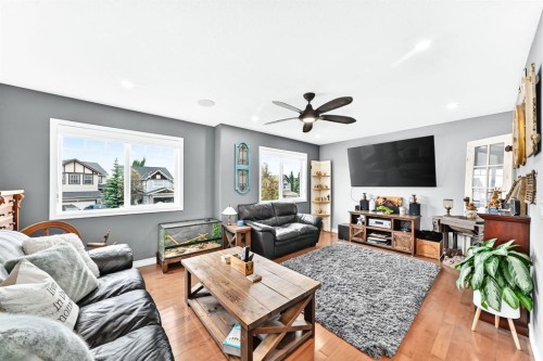 116 Kingsland Court Se, Airdrie, AB - Indoor Photo Showing Living Room