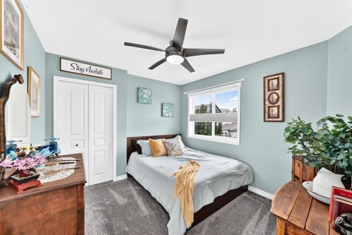 116 Kingsland Court Se, Airdrie, AB - Indoor Photo Showing Bedroom