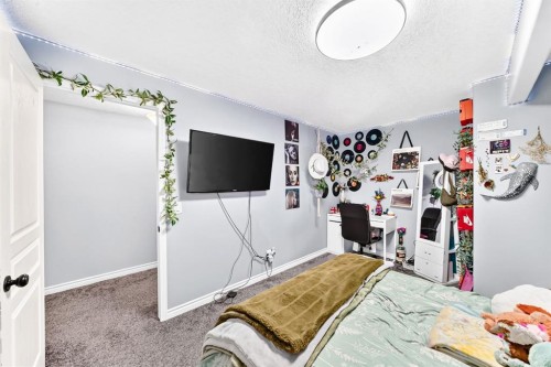 116 Kingsland Court Se, Airdrie, AB - Indoor Photo Showing Other Room